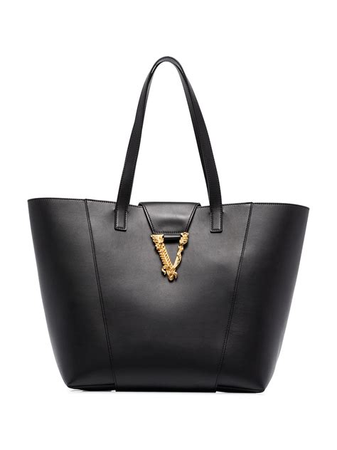 farfetch handbags for women.